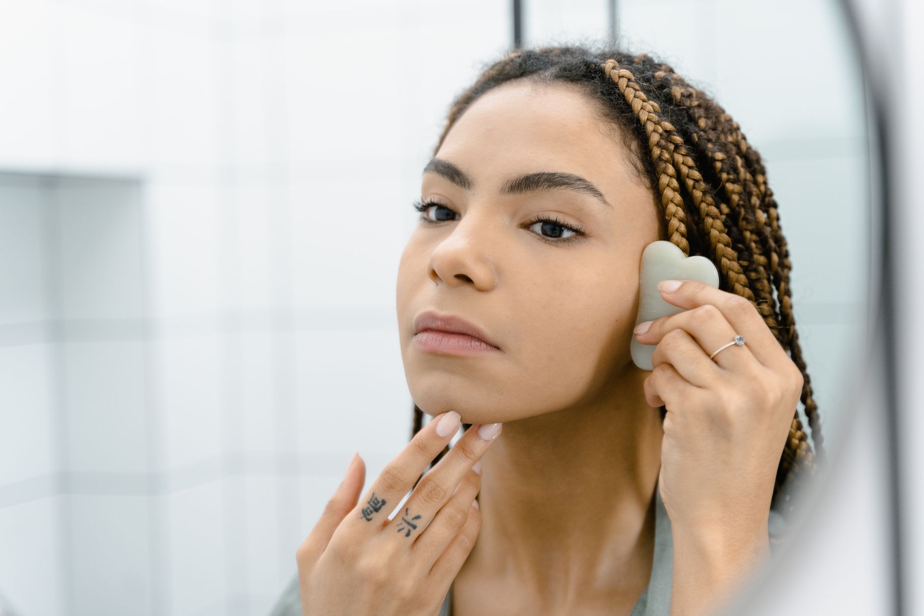 gua sha facial massage detail — Luxury Lashes Federal Way WA